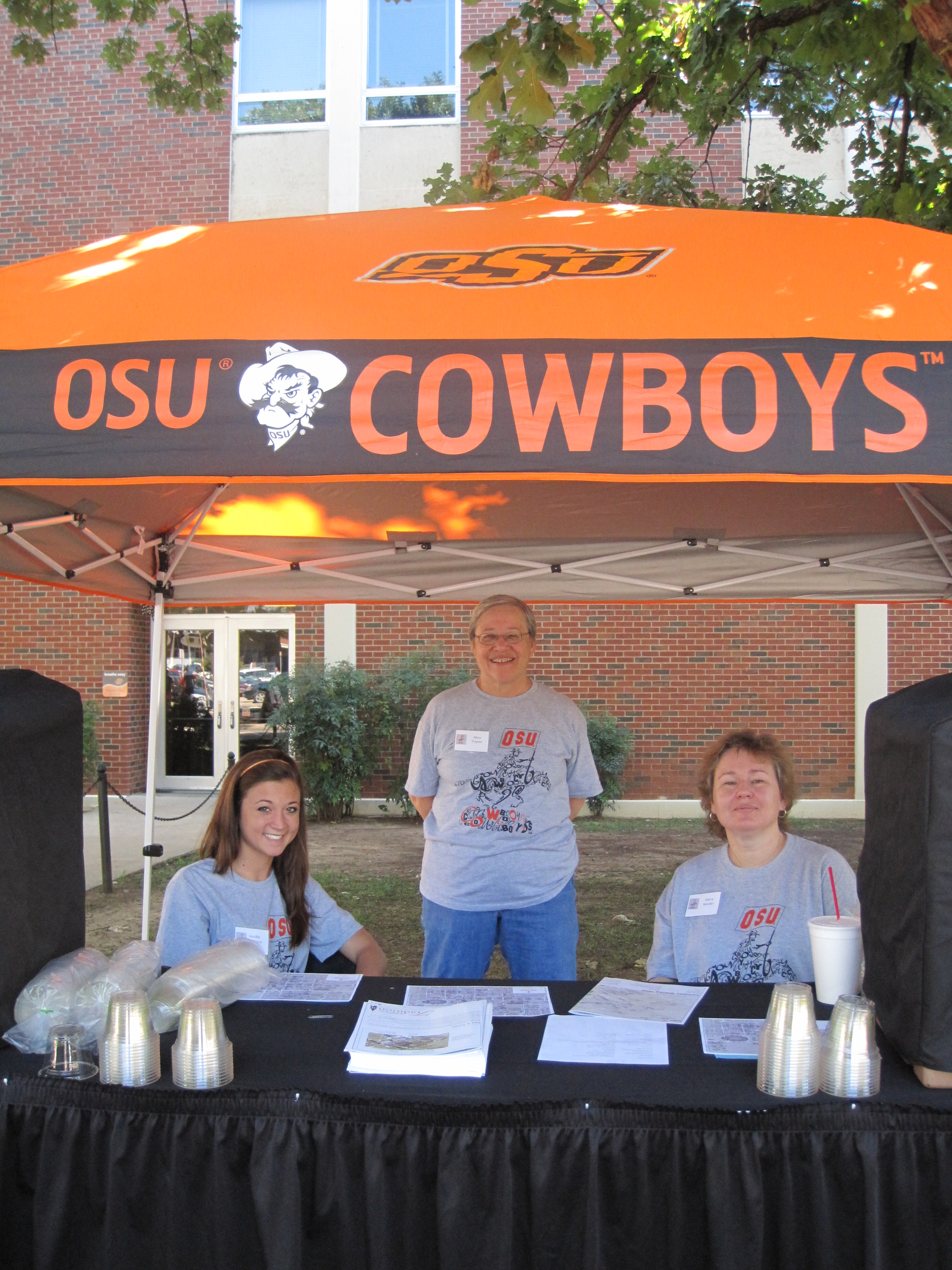 Volunteer staff manning the information and water booths.  This is one of many stationed across campus.