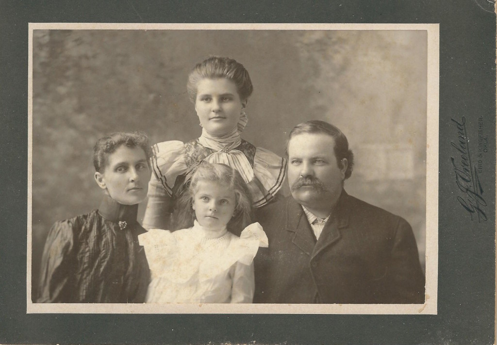 Atlanta B Crouch and her husband are shown left and right; their daughter Iona is center, and daughter (my great-grandmother) Grandmother Coward is shown top center.